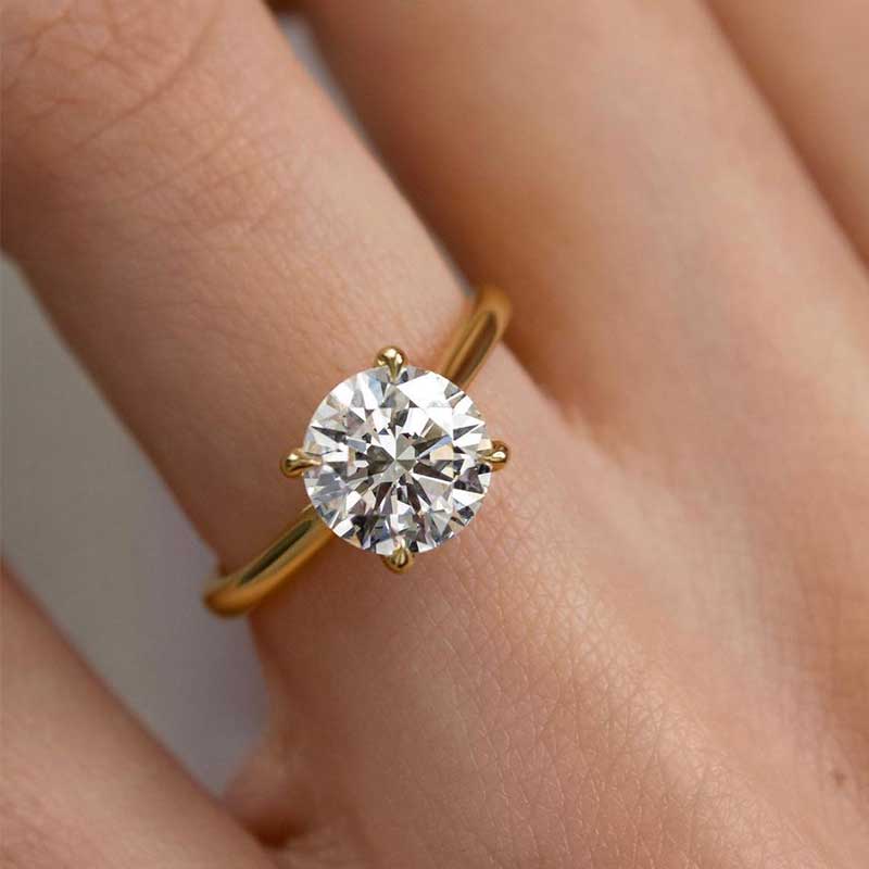 2.0Ct 4-Prong Round Moissanite Ring - Dual-Tone