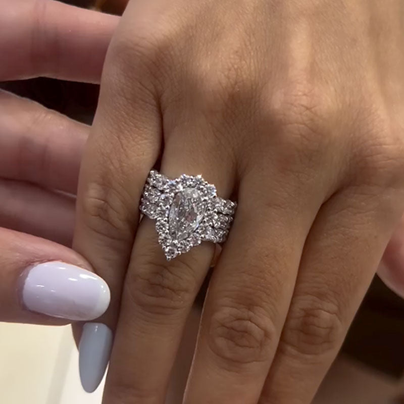 Elegant Pear Cut Halo Anniversary Ring in 925 Silver with 18K White Gold Plating