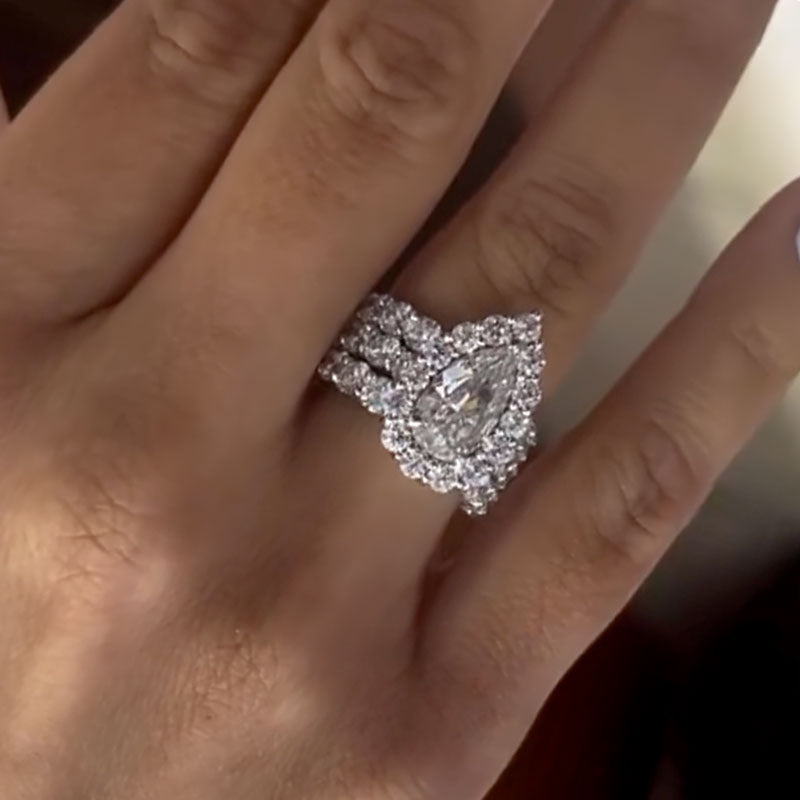 Elegant Pear Cut Halo Anniversary Ring in 925 Silver with 18K White Gold Plating