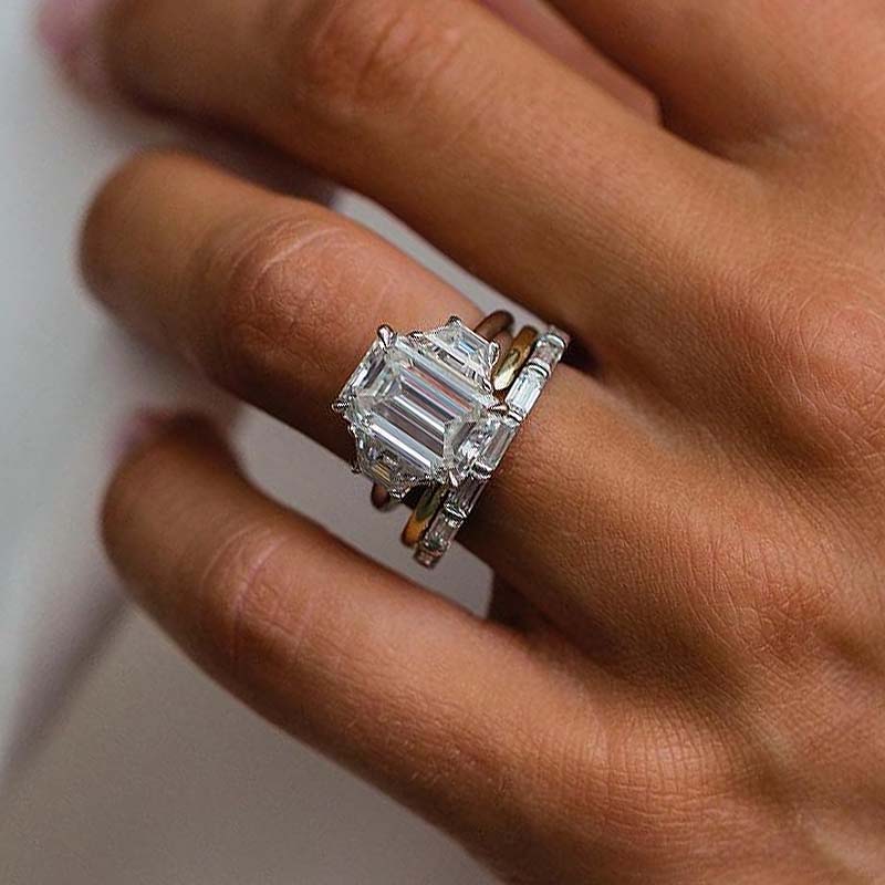 Elegant Emerald Cut Three Stone Wedding Set