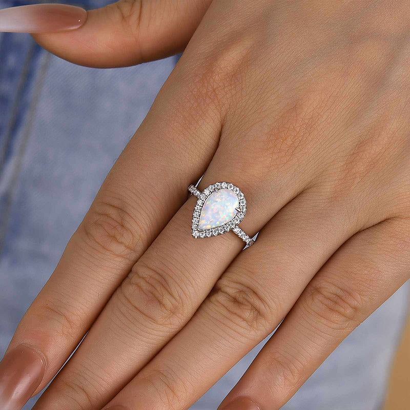 2.2ct Opal Pear Cut Ring with Diamond Accents