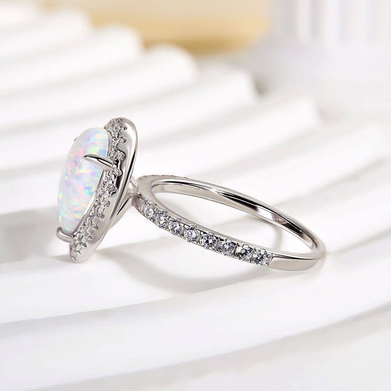 2.2ct Opal Pear Cut Ring with Diamond Accents