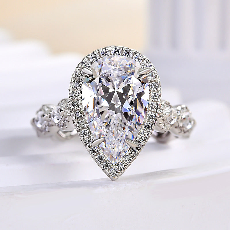 4.0Ct Pear Cut Diamond Ring with Mixed Halo