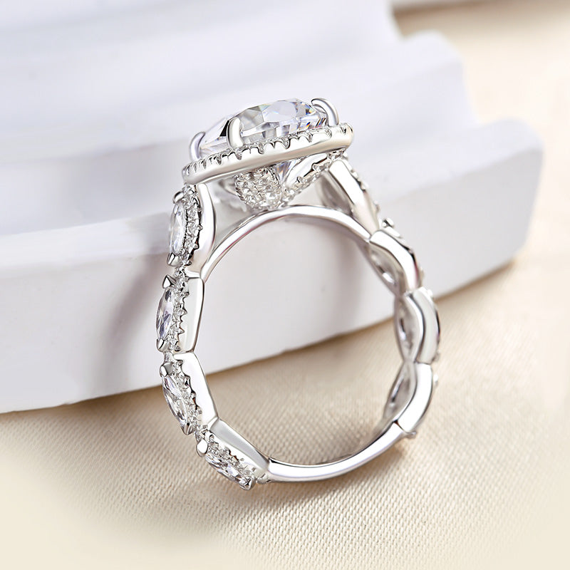 4.0Ct Pear Cut Diamond Ring with Mixed Halo