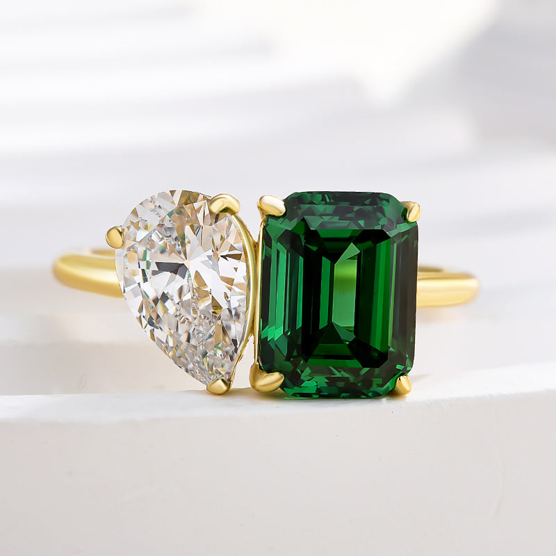 2.5Ct Emerald & 1.8Ct Pear Cut Two-Stone Ring