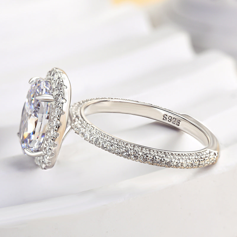 Timeless 2.25ct Oval Diamond Ring with Pavé Detailing