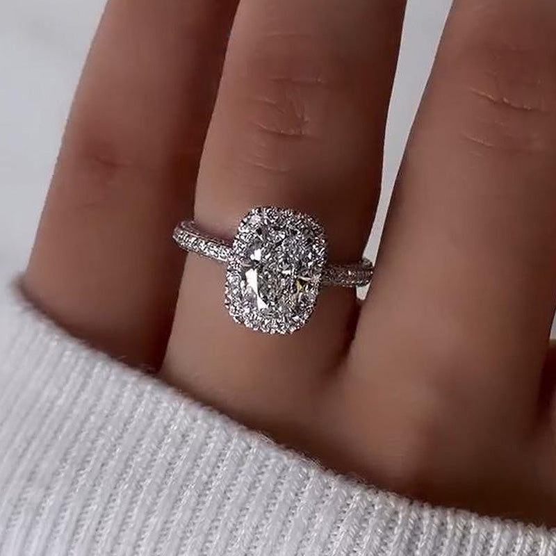 Timeless 2.25ct Oval Diamond Ring with Pavé Detailing