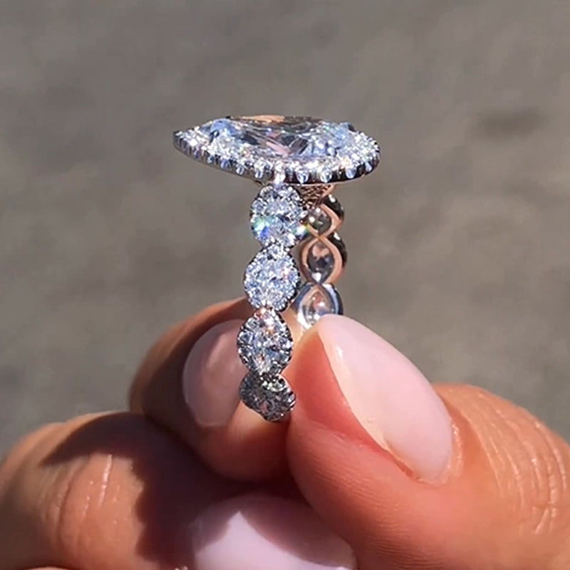 4.0Ct Pear Cut Diamond Ring with Mixed Halo