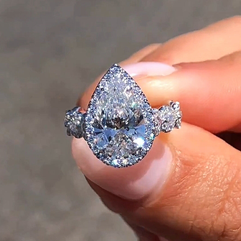 4.0Ct Pear Cut Diamond Ring with Mixed Halo