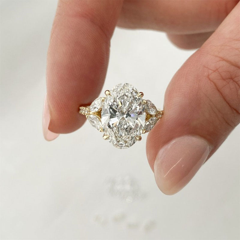 4.0ct Oval Diamond Ring with Mixed Cut Side Stones