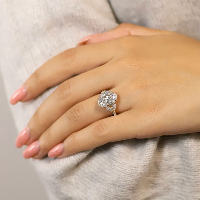 4.0ct Oval Diamond Ring with Mixed Cut Side Stones