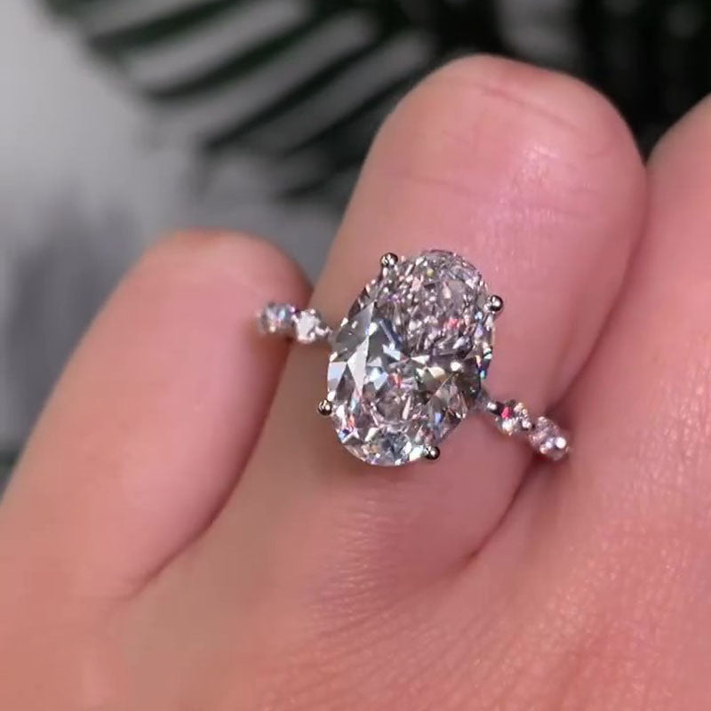 4.5ct Oval Diamond Ring with Mixed Halo & Pavé Band