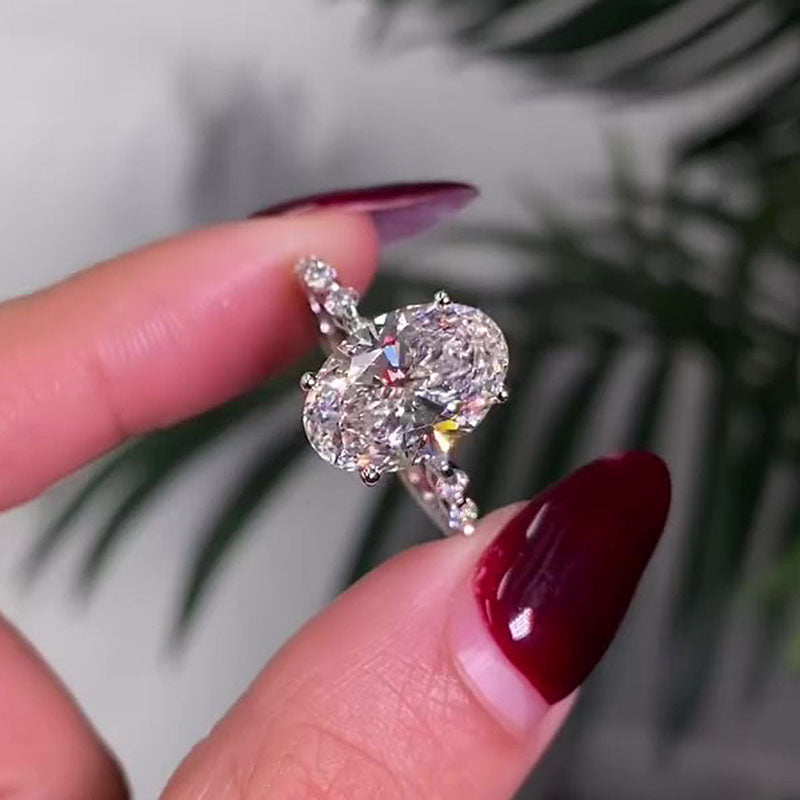 4.5ct Oval Diamond Ring with Mixed Halo & Pavé Band