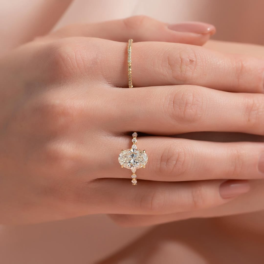 4.5ct Oval Diamond Ring with Mixed Halo & Pavé Band