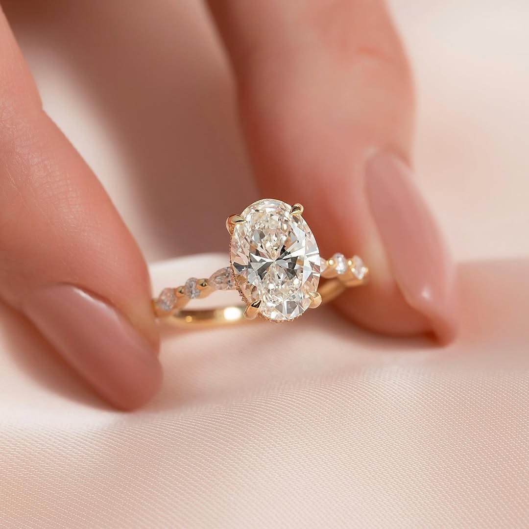 4.5ct Oval Diamond Ring with Mixed Halo & Pavé Band
