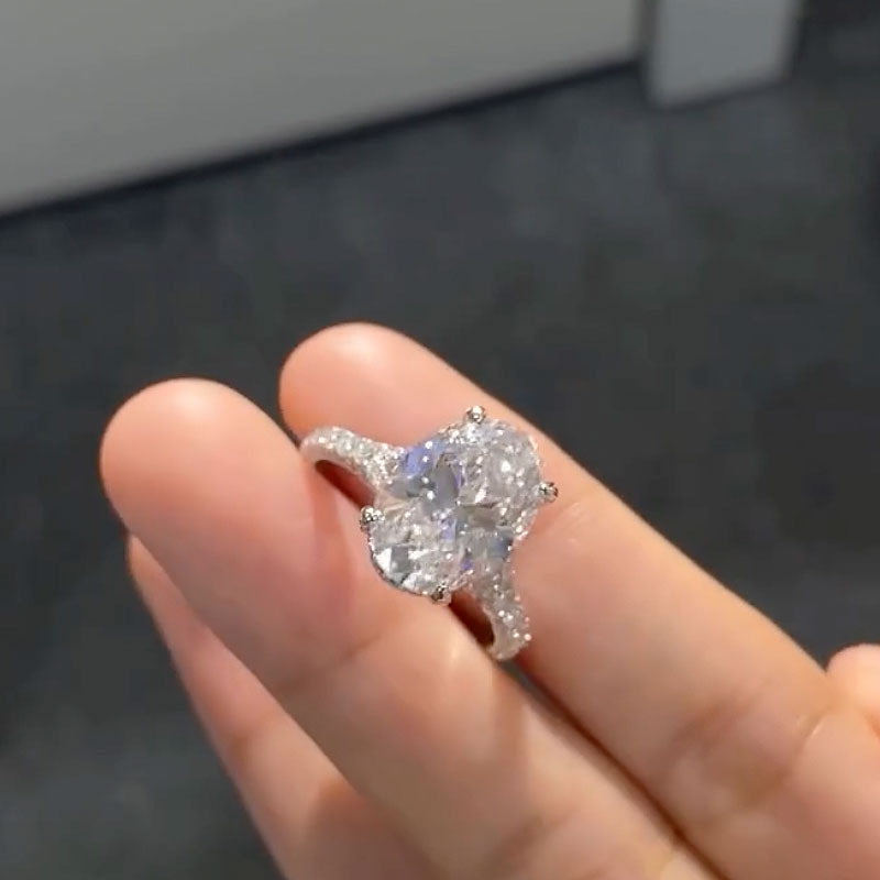 Elegant 4.0ct Oval Diamond Ring with Halo Setting