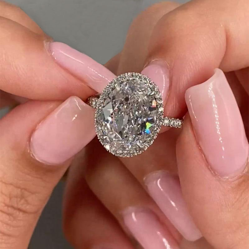 4.25 Carat Oval-Cut Simulated Diamond Halo Ring in Sterling Silver