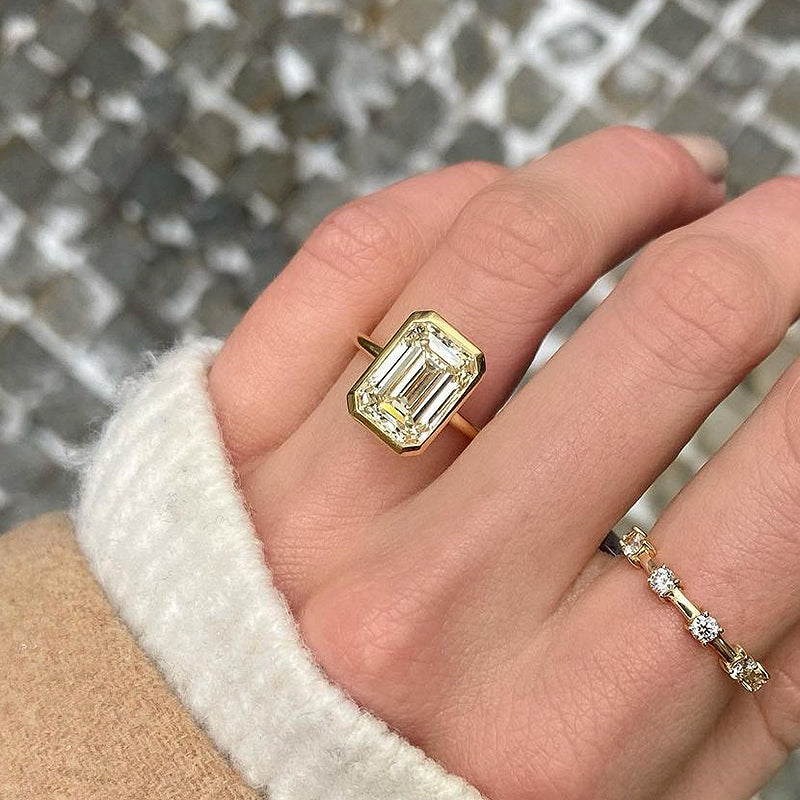 5.5Ct Emerald Cut Diamond Bezel Ring in Gold