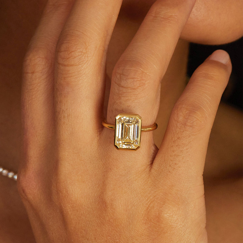 5.5Ct Emerald Cut Diamond Bezel Ring in Gold
