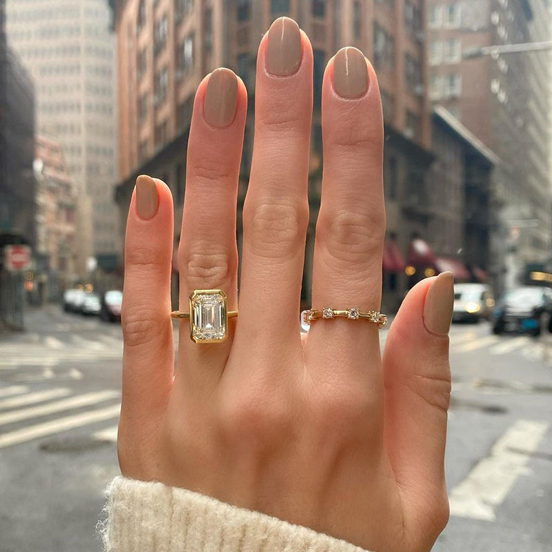 5.5Ct Emerald Cut Diamond Bezel Ring in Gold