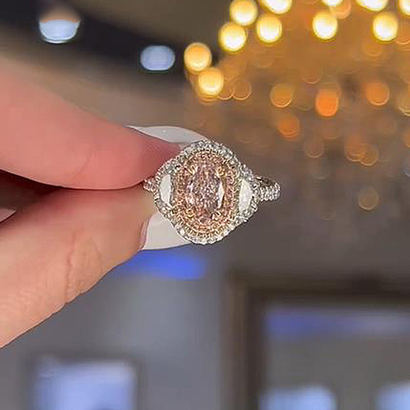 1.5ct Pink Sapphire Oval Ring with Mixed Cut Halo