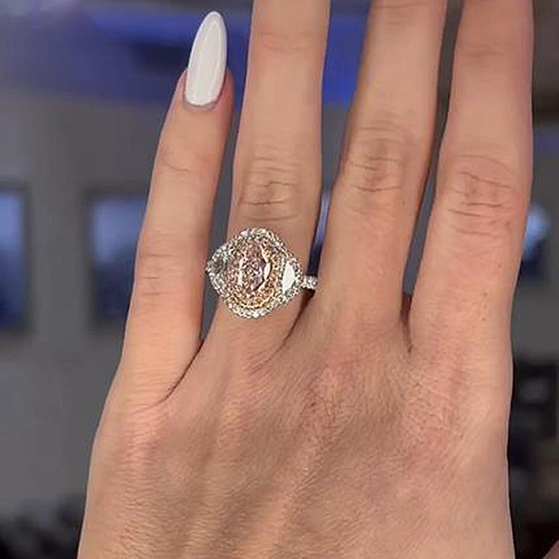 1.5ct Pink Sapphire Oval Ring with Mixed Cut Halo