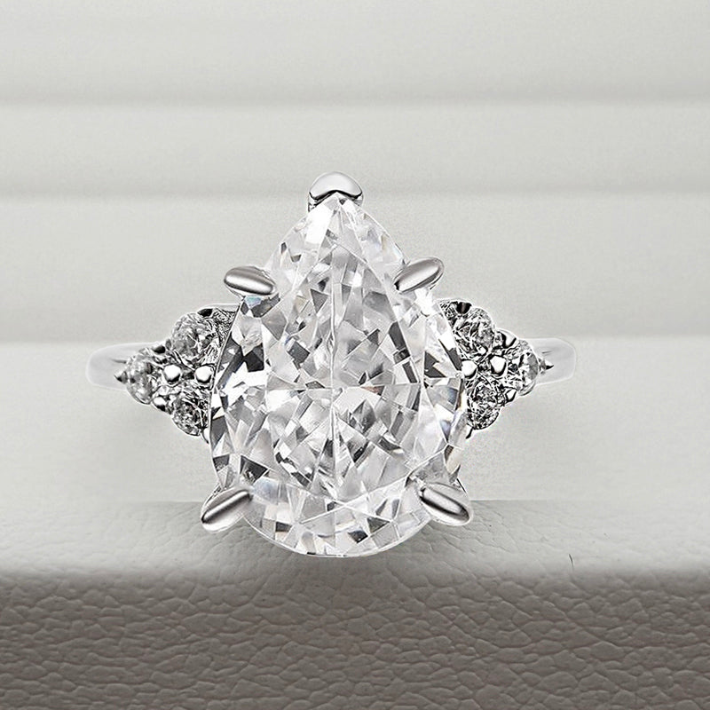 3.0ct Gold Pear Cut Simulated Diamond Ring with Side Stones