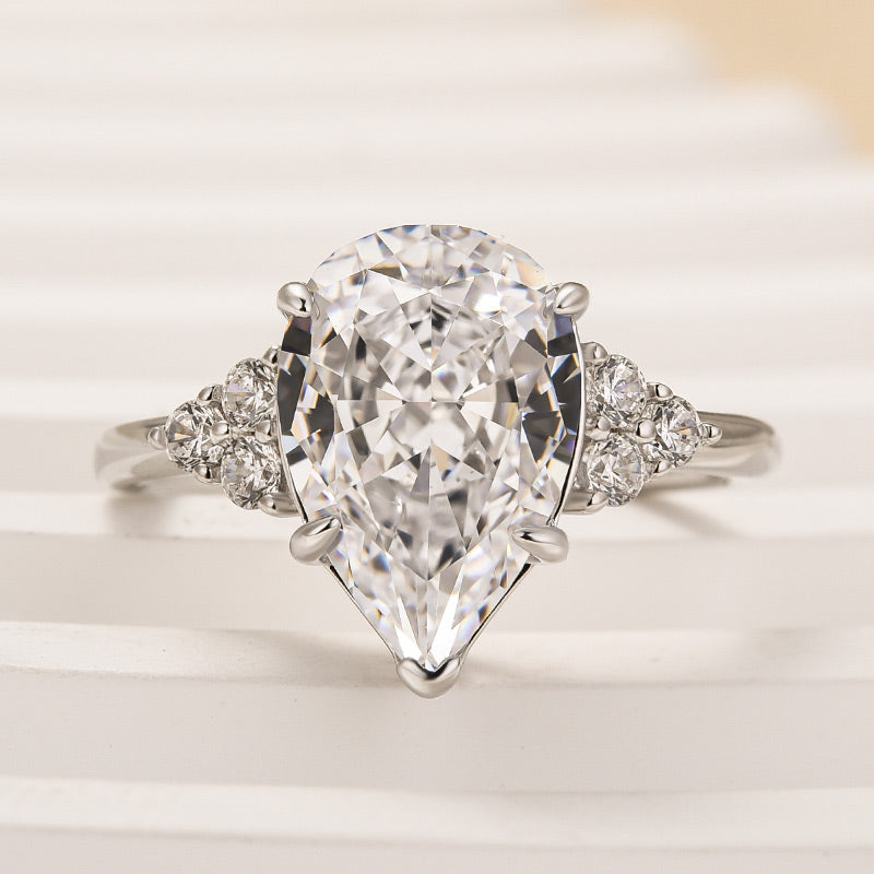 3.0ct Gold Pear Cut Simulated Diamond Ring with Side Stones