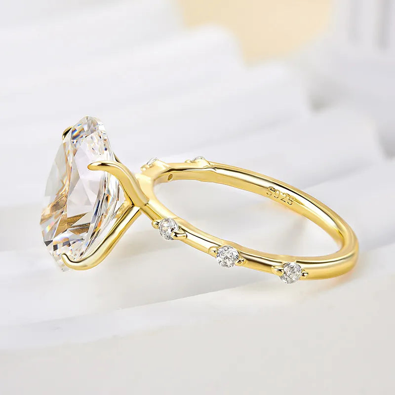 4.0Ct Oval Sona Diamond Gold Ring with Side Stone Detailing