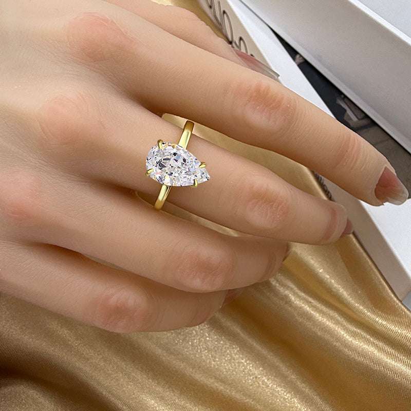 Gorgeous Two-tone Pear Cut Engagement Ring