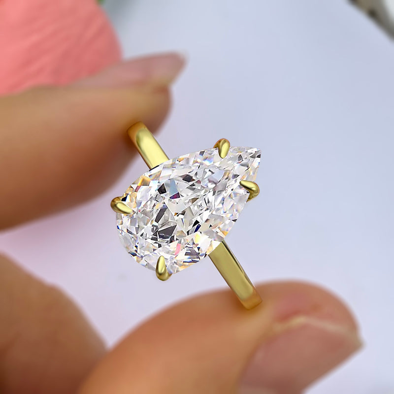 4.0ct Gold Pear Cut Simulated Diamond Ring with Half Eternity Band