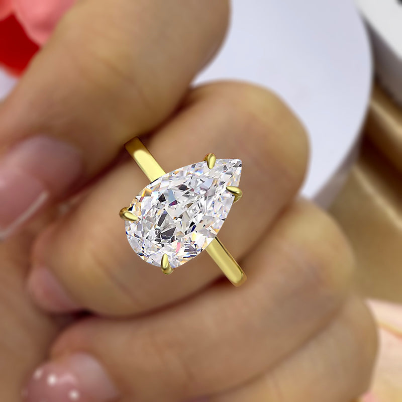 4.0ct Gold Pear Cut Simulated Diamond Ring with Half Eternity Band