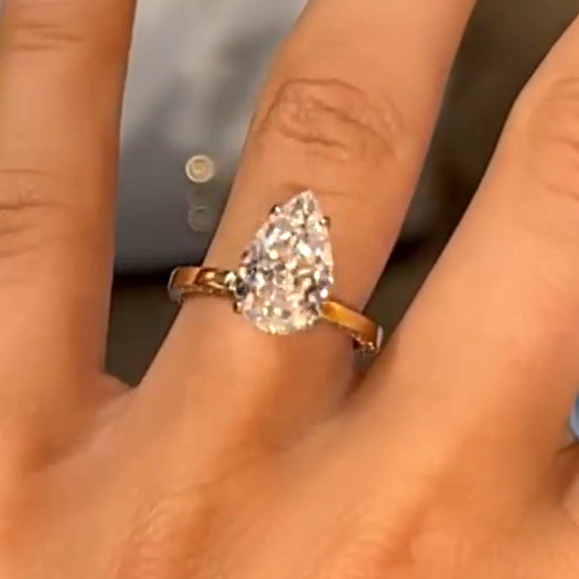 4.0ct Gold Pear Cut Simulated Diamond Ring with Half Eternity Band