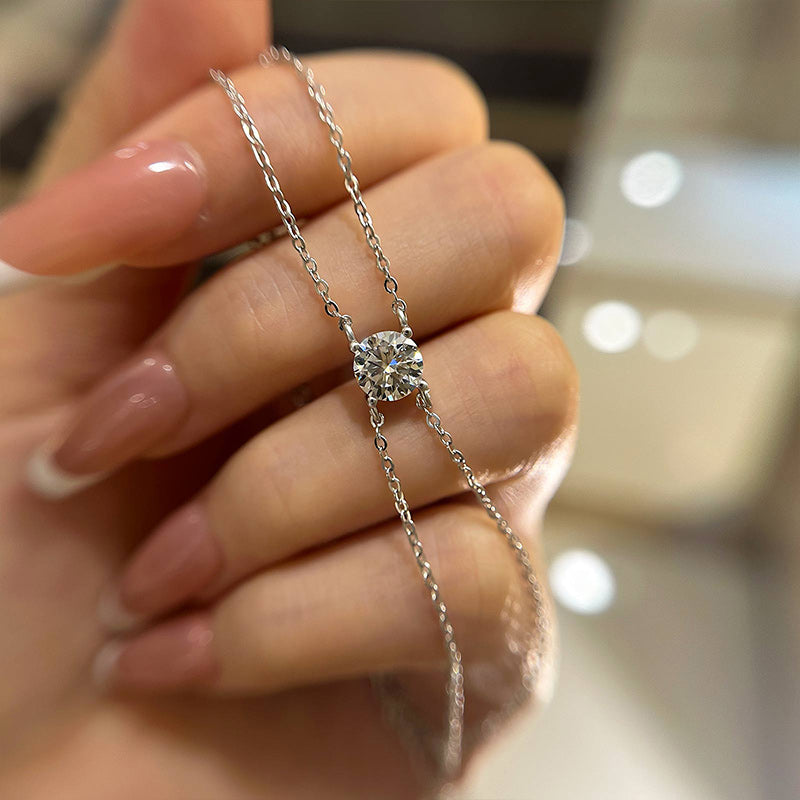 Elegant Round-Cut Moissanite Bracelet in 18K White Gold