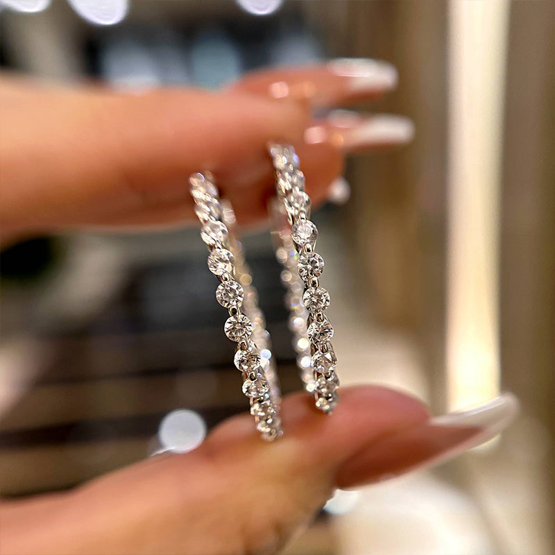 Round Simulated Diamond Earrings in Sterling Silver
