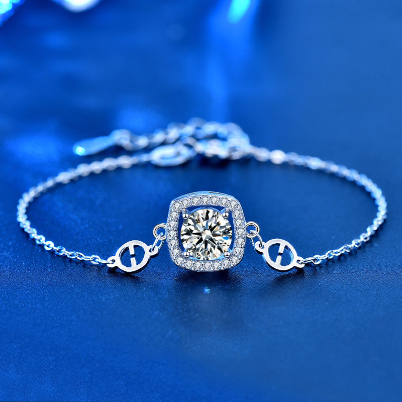 Pulsera atemporal de moissanita de talla redonda en oro blanco de 18 quilates