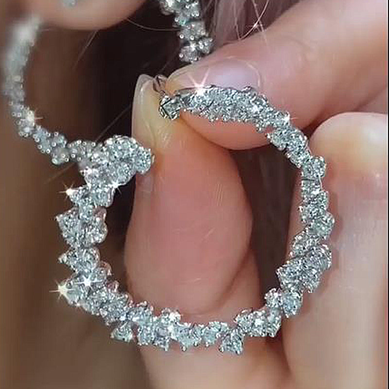Timeless Round Cut Simulated Diamond Earrings in White Gold Plated
