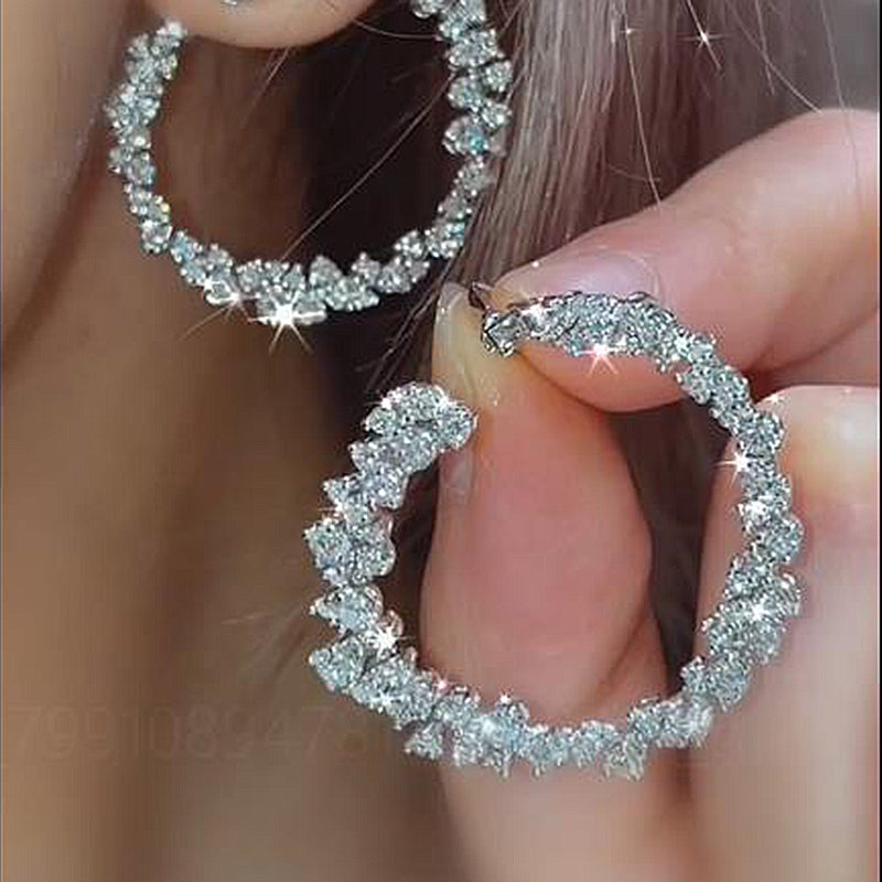 Timeless Round Cut Simulated Diamond Earrings in White Gold Plated