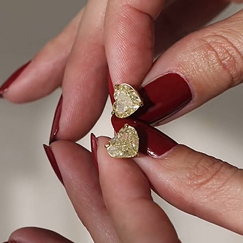 Pendientes de diamantes simulados de talla corazón de 1,25 quilates en plata de ley