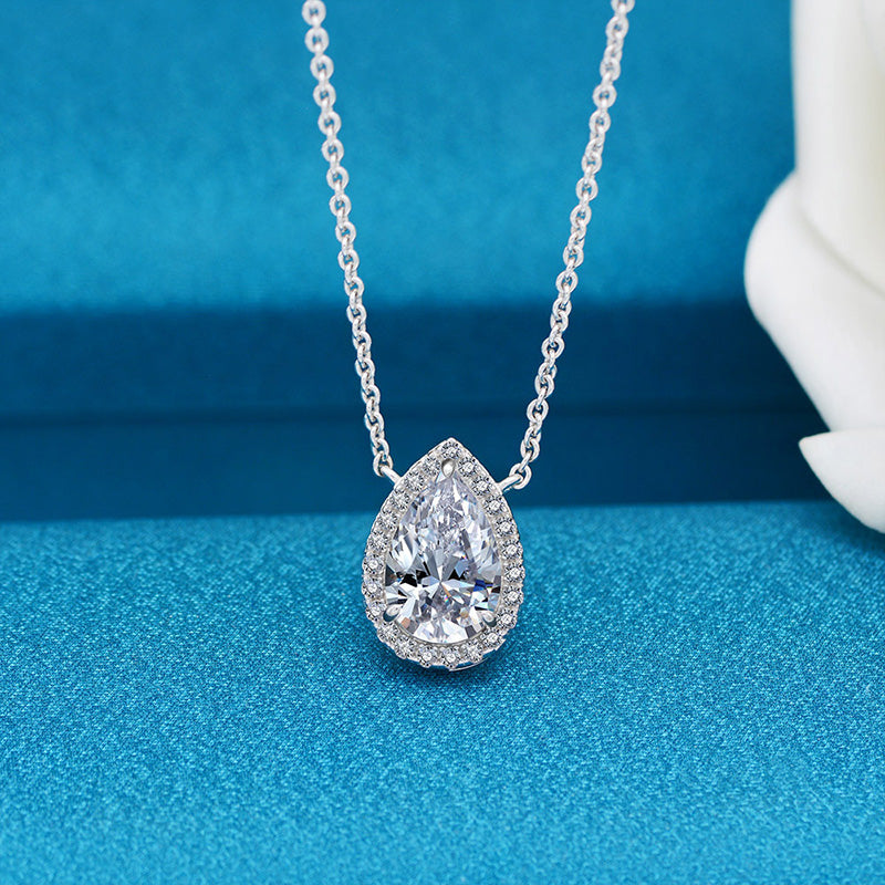 Conjunto de 2 joyas de diamantes simulados de talla pera en plata de ley y oro blanco.