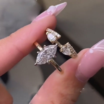 4Ct Marquise Diamond Ring with Pear Accents