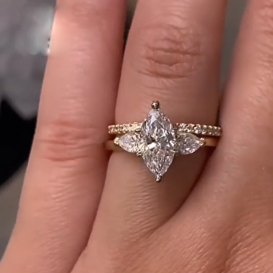 4Ct Marquise Diamond Ring with Pear Accents