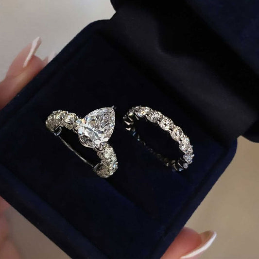 4Ct Pear Cut Diamond Ring with 5Ct Band in White Gold Plated Silver