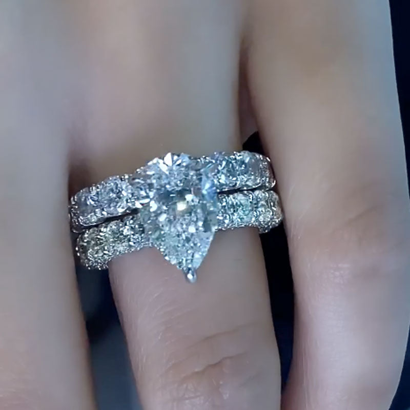 4Ct Pear Cut Diamond Ring with 5Ct Band in White Gold Plated Silver