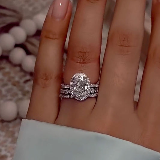 4Ct Oval Diamond Ring with Round Accents