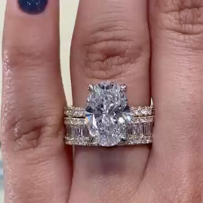 6Ct Oval Simulated Diamond Ring with Emerald Cut Band