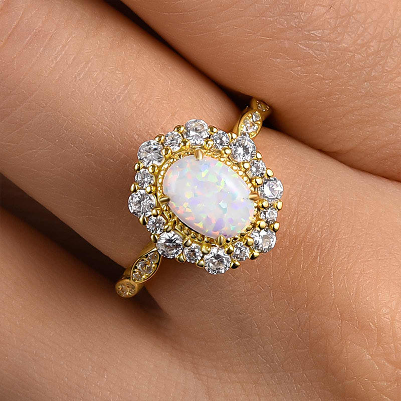 1.25ct Oval Opal & Diamond Vintage Halo Ring