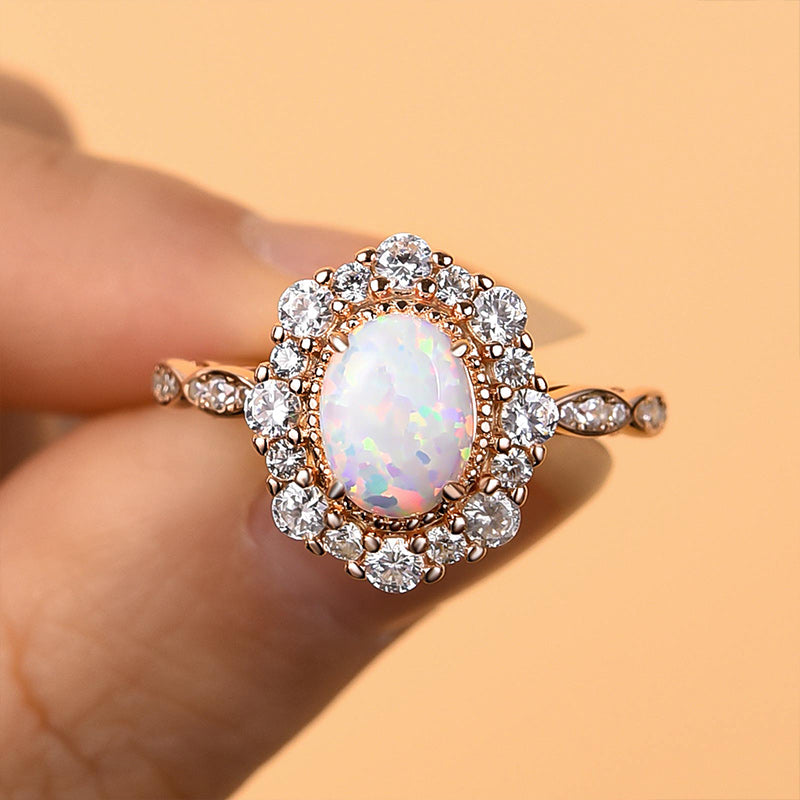 1.25ct Oval Opal & Diamond Vintage Halo Ring