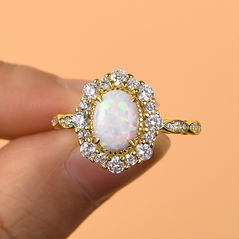 1.25ct Oval Opal & Diamond Vintage Halo Ring