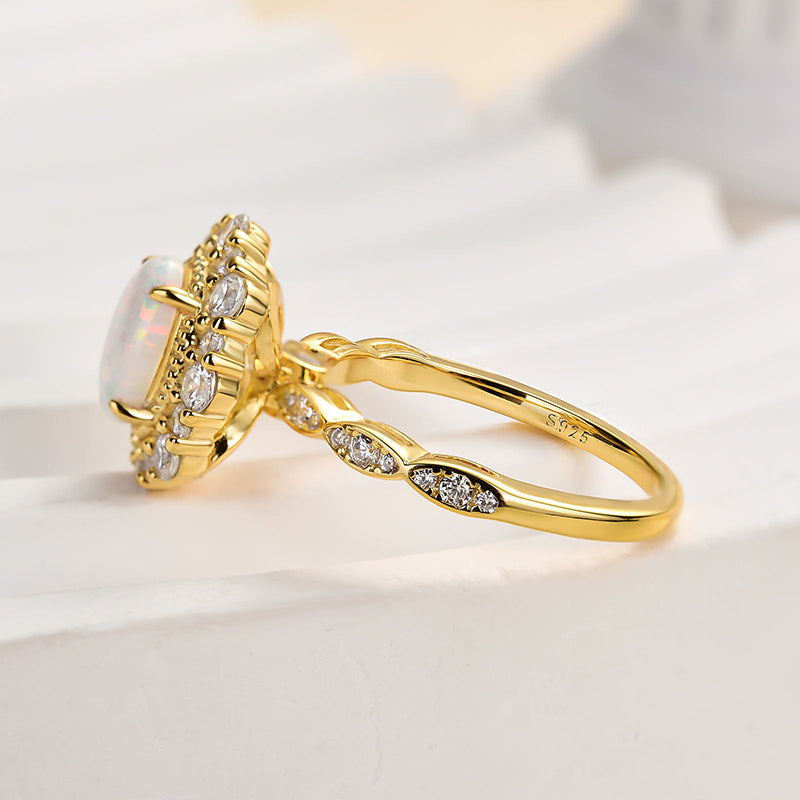1.25ct Oval Opal & Diamond Vintage Halo Ring